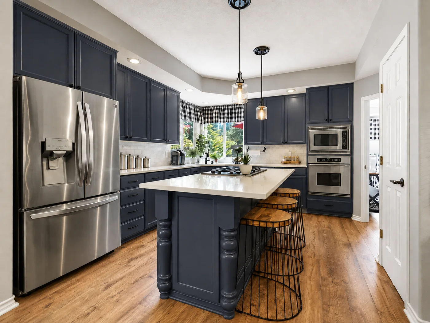 Dark navy professional cabinet finish by Riversons Painting