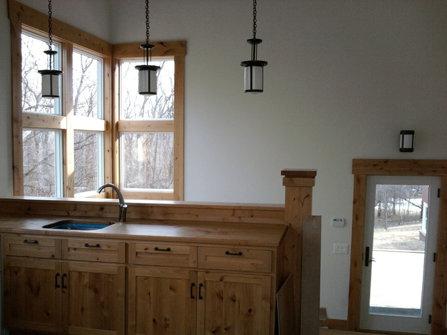 Natural wood cabinetry and trim finish project